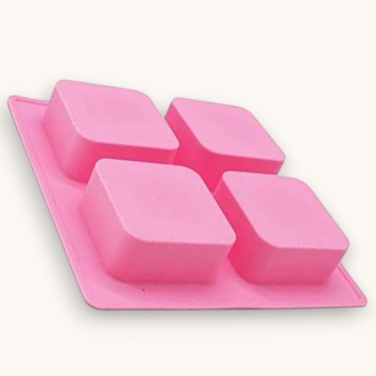 4 cavity square silicone mould with rounded corners for soap making, lotion bars, shampoo bars and resin crafts.